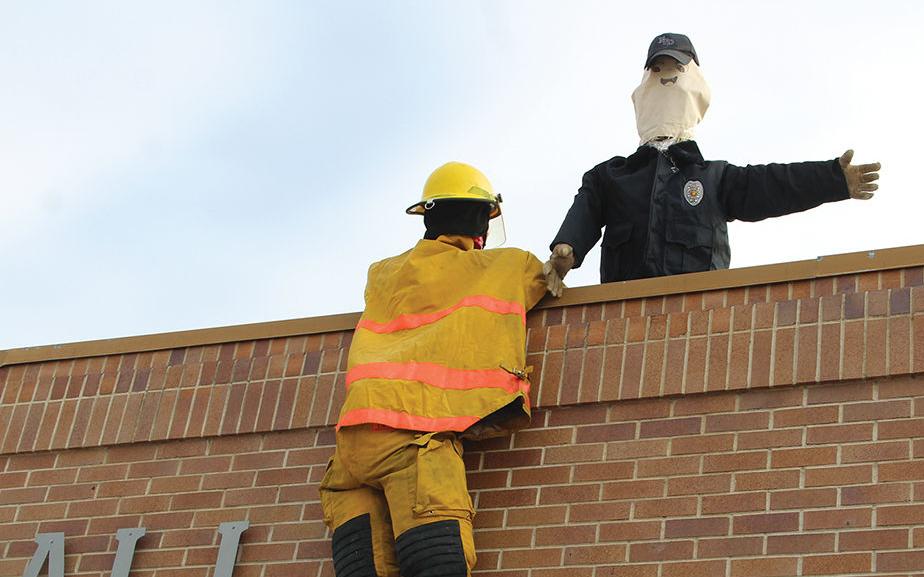 First responder scarecrows show up on top of Nyssa City Hall